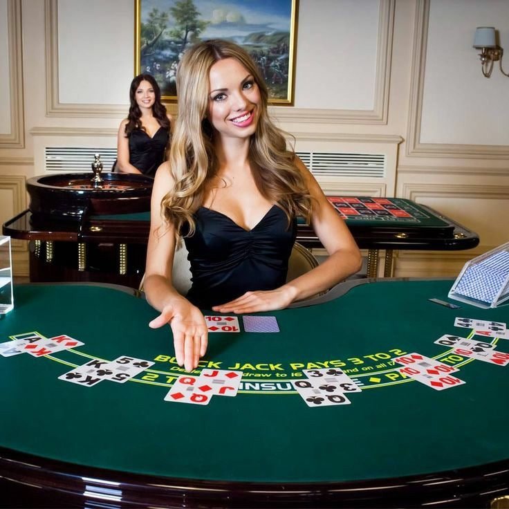 Mobile app interface showing live match score and live blackjack table side-by-side